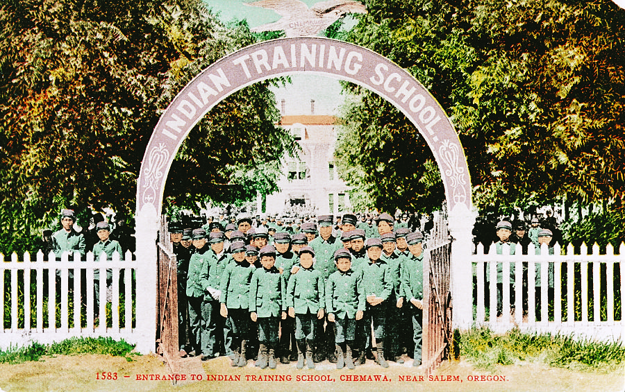 Students posing at entrance to Chemawa Indian Training School, near Salem, Oregon, 1905